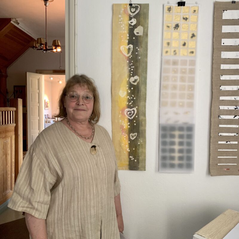 Pirjo Heino with her work (hearts)